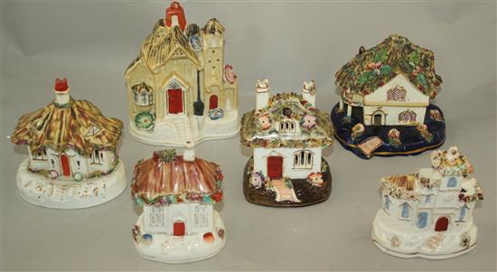 Six Staffordshire porcelain thatched roof models of houses and cottages, mid 19th century, height 10.5 - 15.5cm